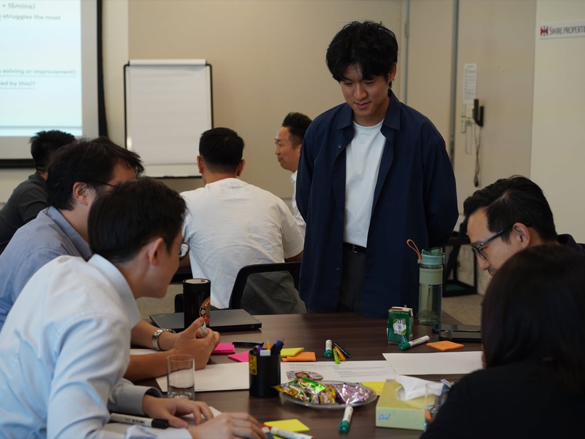 Frankie leading enterprise strategy sessions and design thinking workshops